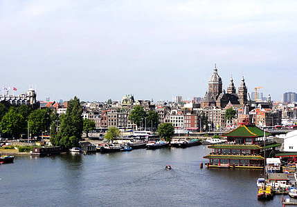 body of water with buildings thumbnail