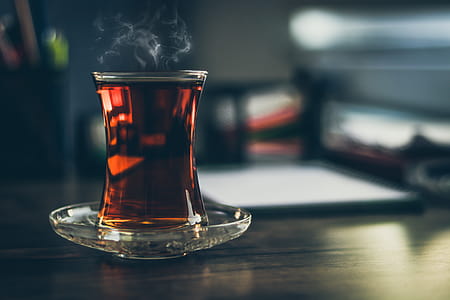 Close-up Photo of Steaming Black Tea in Glass thumbnail