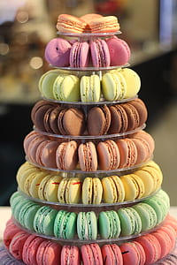 assorted-color of macarons on clear glass 8-tier tray thumbnail
