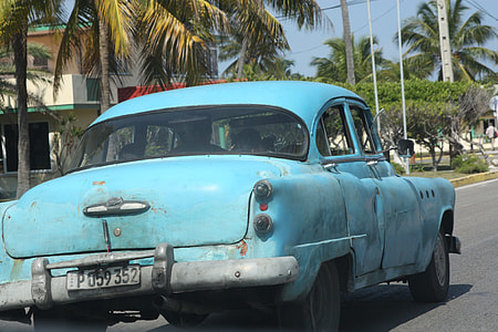 blue vehicle on the road thumbnail
