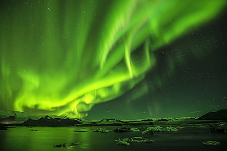 green aurora borealis during nighttime thumbnail
