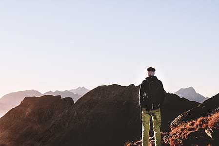 Person Standing on Top of the Mountain thumbnail