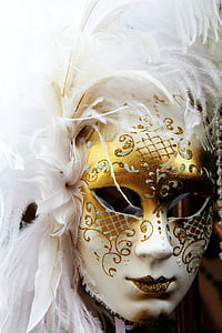 person wearing white and gold glittered cocktail mask thumbnail
