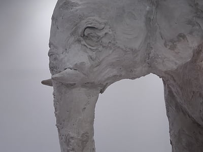 close-up photography of white elephant sculpture thumbnail