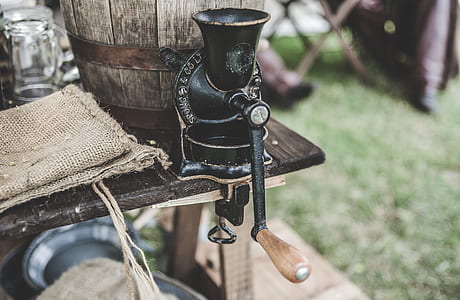 macro photography of black manual meat grinder thumbnail