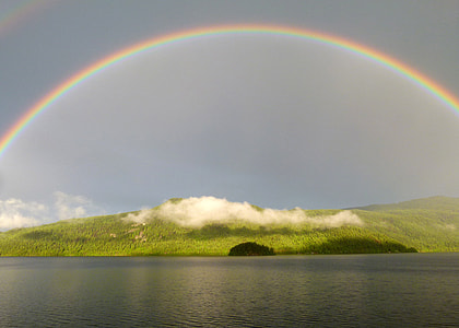 Rainbow over the landscape in British Columbia, Canada thumbnail