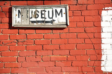 museum text signage on wall thumbnail