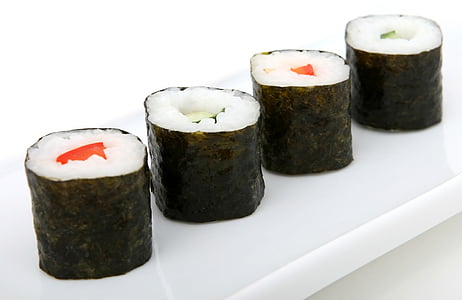 sushi on white ceramic platter thumbnail