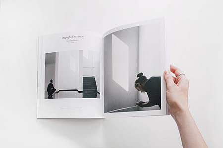 person holding book thumbnail