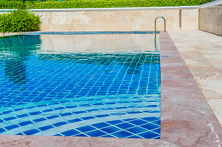 blue and brown pool during daytime thumbnail