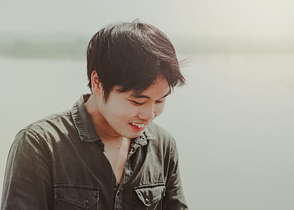 Close-Up Photography of a Man Smiling thumbnail