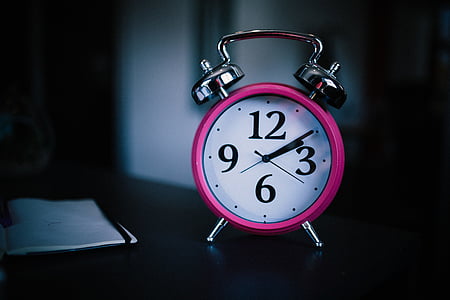 analog desk clock at 2:09 thumbnail