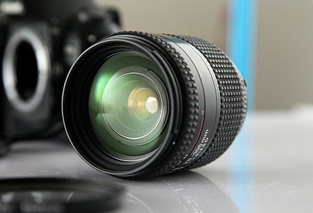 black telephoto lens on gray surface thumbnail