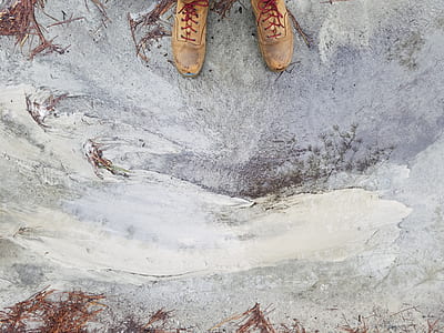 person stepping on brown floor thumbnail