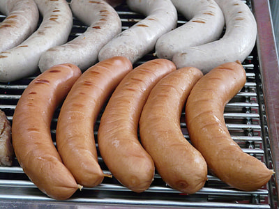 sausage grilling on grill thumbnail