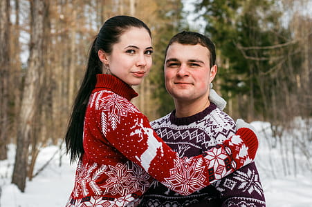Woman in Red and White Christmas Theme Sweater thumbnail