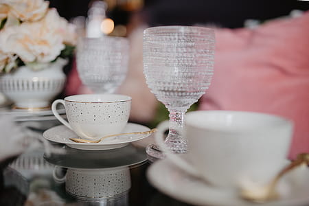 Porcelain and glass dishware on the glass table thumbnail