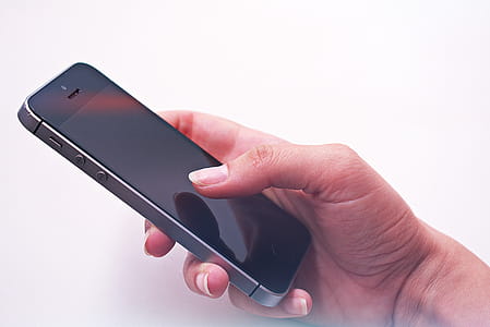 Person Holding Space Grey Iphone thumbnail