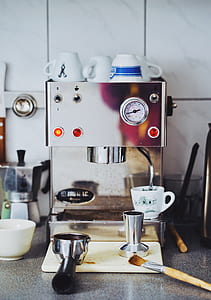 stainless steel espresso maker on gray marble surface thumbnail