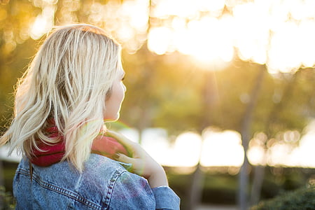 woman standing in front of tree thumbnail