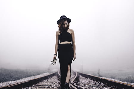 woman holding flowers in railway thumbnail