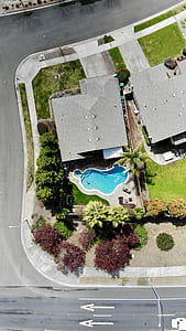aerial view photography of house with outdoor pool thumbnail