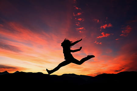 silhouette of woman jumping thumbnail