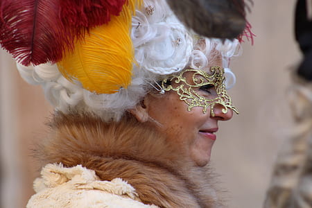 woman wearing gold mask thumbnail