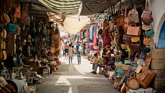 people walking in marketplace during daytime thumbnail