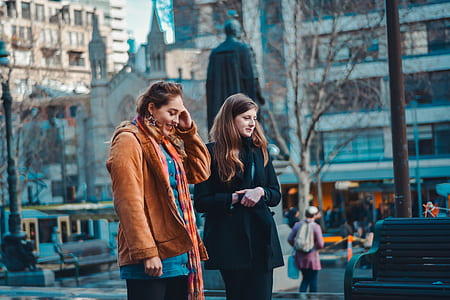 women standing in street thumbnail