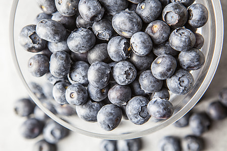 Close-up shot of blueberries in a glass bowl, image captured with a Canon 5D DSLR thumbnail