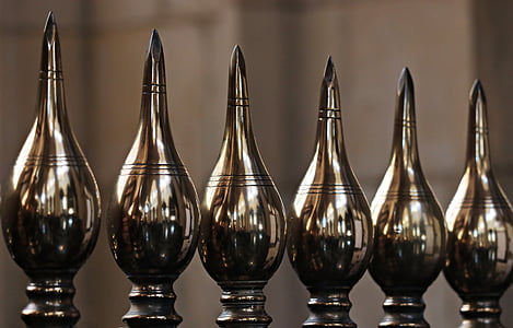 several brown metal ball spikes selective focus photography thumbnail