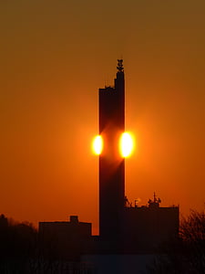 photography of building under golden sky thumbnail