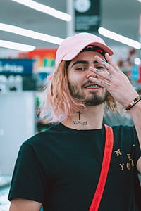 man showing tattoo art thumbnail