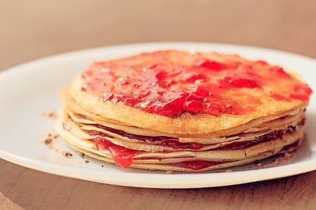Selective Focus Photograph of Strawberry Jam Crepe Cake thumbnail