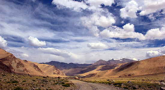 landscape photography of brown mountains thumbnail