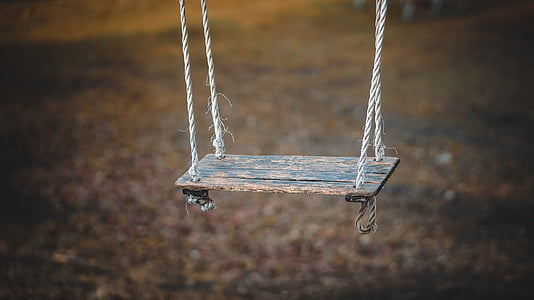 brown wooden swing thumbnail