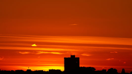 silhouette of buildings during sunset thumbnail