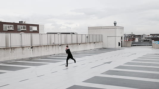 man running on rooftop thumbnail