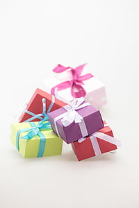 five assorted-color gift boxes thumbnail