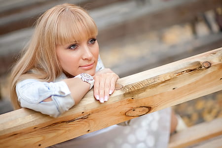woman leaning on railing thumbnail