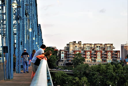 People Looking Down A Bridge thumbnail