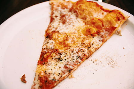slice of pizza on plate thumbnail