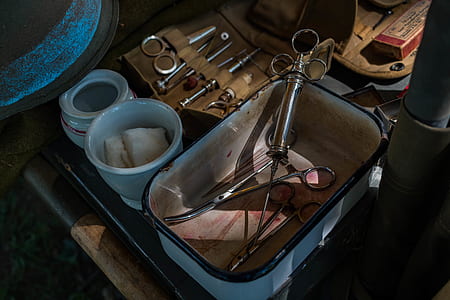 photo of bowl filled with assorted surgical tools thumbnail