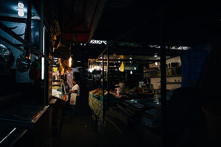 man standing in front of store thumbnail
