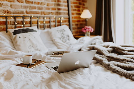 Morning coffee in bed. Working in bed thumbnail