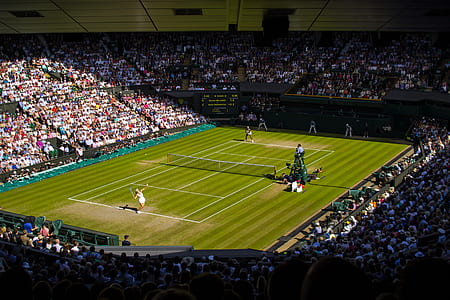 people watching tennis game during day thumbnail