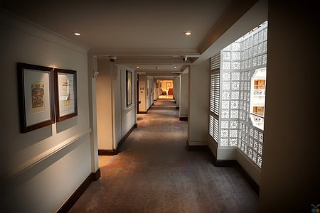empty room with paintings on wall thumbnail