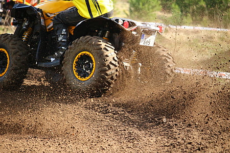 person riding on ATV thumbnail