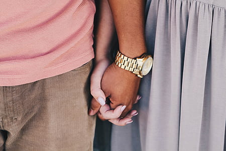 man and woman holding hands thumbnail